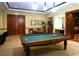 Game room with billiard table and additional seating area at 2050 Benjamin Franklin Dr # A601, Sarasota, FL 34236