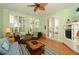 Bright living room with comfortable seating and large windows at 2050 Benjamin Franklin Dr # A601, Sarasota, FL 34236