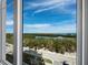 Stunning water view from large window, showcasing waterfront property at 2050 Benjamin Franklin Dr # A601, Sarasota, FL 34236