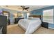 Large bedroom with a king-size bed and plenty of natural light at 223 Heritage Isles Way, Bradenton, FL 34212