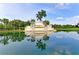 Heritage Harbour community entrance with lake view at 223 Heritage Isles Way, Bradenton, FL 34212