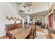 Spacious dining room with a large table and access to the living area at 223 Heritage Isles Way, Bradenton, FL 34212