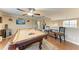 Pool table is the centerpiece of this game room at 223 Heritage Isles Way, Bradenton, FL 34212