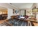 Game room with foosball table, shuffleboard, and comfortable seating at 223 Heritage Isles Way, Bradenton, FL 34212