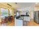 Eat-in kitchen that features a breakfast bar and granite countertops at 223 Heritage Isles Way, Bradenton, FL 34212