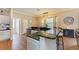 Modern kitchen with granite countertops and stainless steel appliances at 223 Heritage Isles Way, Bradenton, FL 34212
