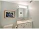 Bathroom with vanity, toilet, and medicine cabinet at 2723 Orchid Oaks Dr # 104, Sarasota, FL 34239