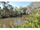 Peaceful canal view, surrounded by Florida foliage at 2723 Orchid Oaks Dr # 104, Sarasota, FL 34239