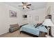 Guest bedroom with a comfortable bed, and sitting area at 2763 Phoenix Palm Ter, North Port, FL 34288