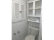 Clean bathroom, featuring a toilet, bathtub, and storage at 2807 W 52Nd Ter, Bradenton, FL 34207