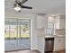 Modern kitchen with stainless steel appliances and sliding door to patio at 2807 W 52Nd Ter, Bradenton, FL 34207