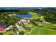 Aerial view of the golf course and clubhouse at 282 Shell Midden Ct, Osprey, FL 34229