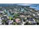 Aerial view of the property and waterfront community at 282 Shell Midden Ct, Osprey, FL 34229