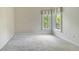 Spacious bedroom with neutral walls and carpet at 282 Shell Midden Ct, Osprey, FL 34229