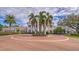 Circular drive leading to the elegant clubhouse entrance at 282 Shell Midden Ct, Osprey, FL 34229