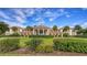 Luxury clubhouse with columns and landscaping at 282 Shell Midden Ct, Osprey, FL 34229