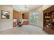 Home office with custom cabinetry and built-in bookshelves at 282 Shell Midden Ct, Osprey, FL 34229