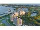 Aerial view of waterfront community with marina at 3010 Grand Bay Blvd # 493, Longboat Key, FL 34228