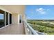 Enjoy serene views of water and lush landscape from this balcony at 3010 Grand Bay Blvd # 493, Longboat Key, FL 34228