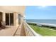 Spacious balcony overlooking the water and golf course at 3010 Grand Bay Blvd # 493, Longboat Key, FL 34228