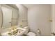 Elegant bathroom with a floral-print sink and gold fixtures at 3010 Grand Bay Blvd # 493, Longboat Key, FL 34228