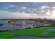 Night view of the marina and golf course at 3010 Grand Bay Blvd # 493, Longboat Key, FL 34228