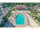 Resort-style pool with ample lounge chairs and landscaping at 3010 Grand Bay Blvd # 493, Longboat Key, FL 34228