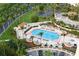 Resort-style pool with plenty of lounge chairs and landscaping at 3010 Grand Bay Blvd # 493, Longboat Key, FL 34228