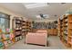 Relaxing clubhouse library with ample bookshelves at 3336 Tallywood Ct # 7084, Sarasota, FL 34237