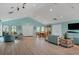 Clubhouse with light teal walls and wood flooring at 3336 Tallywood Ct # 7084, Sarasota, FL 34237