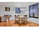 Bright dining area with granite-topped table and four chairs at 3336 Tallywood Ct # 7084, Sarasota, FL 34237