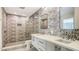 Modern bathroom with double vanity and patterned tile shower at 345 Madison Dr, Sarasota, FL 34236