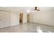 Light-filled bedroom with marble floors and access to bathroom at 345 Madison Dr, Sarasota, FL 34236