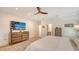 Bright bedroom with ensuite bathroom and hardwood floors at 345 Madison Dr, Sarasota, FL 34236