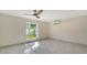 Spacious bedroom with marble floors and a ceiling fan at 345 Madison Dr, Sarasota, FL 34236