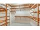 Spacious closet with ample wooden shelving at 345 Madison Dr, Sarasota, FL 34236