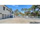 Spacious driveway leading to a modern home with garage at 345 Madison Dr, Sarasota, FL 34236