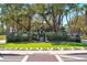 Landscaped park with a statue and paved walkway at 345 Madison Dr, Sarasota, FL 34236