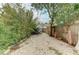 Gravel backyard with shed and wooden fence at 3601 Yardley N Ave, St Petersburg, FL 33713