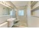 Modern bathroom with large walk-in shower and tiled walls at 3601 Yardley N Ave, St Petersburg, FL 33713