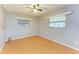 Spacious bedroom with wood floors and ceiling fan at 3601 Yardley N Ave, St Petersburg, FL 33713