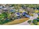 Aerial view of house, highlighting its setting and yard at 3651 Country Place Blvd, Sarasota, FL 34233