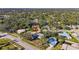 Aerial view showcasing home's location in a quiet neighborhood at 3651 Country Place Blvd, Sarasota, FL 34233