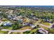 Aerial view showcasing home's location in a residential neighborhood at 3651 Country Place Blvd, Sarasota, FL 34233