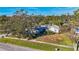 Aerial view of the house and surrounding neighborhood at 3651 Country Place Blvd, Sarasota, FL 34233