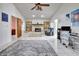 Living room features a stone fireplace and tiled floors at 3651 Country Place Blvd, Sarasota, FL 34233