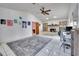 Living room with fireplace, vaulted ceiling, and tiled floors at 3651 Country Place Blvd, Sarasota, FL 34233