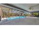 Screened pool area with ceiling fan at 3651 Country Place Blvd, Sarasota, FL 34233