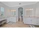 Double vanity bathroom with plenty of counter space and natural light at 366 S Creek Ct, Osprey, FL 34229