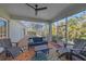 Relaxing screened patio with seating area and view of the pool at 366 S Creek Ct, Osprey, FL 34229